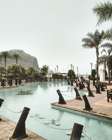 Park near the beach with view on mountains. Beautiful park with swiming pool.
