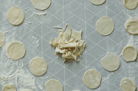 Process of preparation homemade food with flour. Cut the rounds from dough.の写真素材