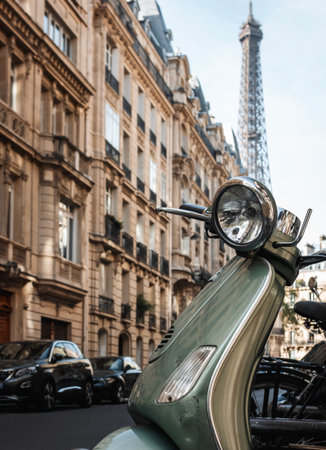 PARIS, FRANCE - OCTOBER 1, 2023: scooter on the street with an Eiffel Towerのeditorial素材