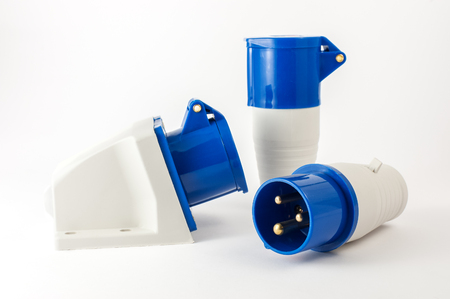 Electric plastic power plug and various sockets with cap isolated on white backgroundの写真素材