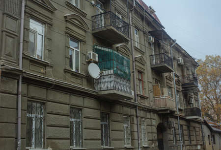 Modern balcony and air conditioners on a facade of old building in Odesaの写真素材