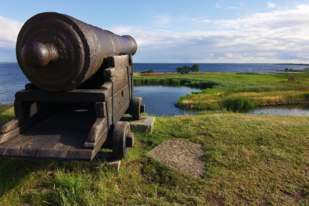 Ancient cannon aimed at the sea in the Kalmar castle, Sweden. のeditorial素材