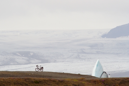 Bicycle in Iceland, Vatnajokull glacier in the backgroundの写真素材