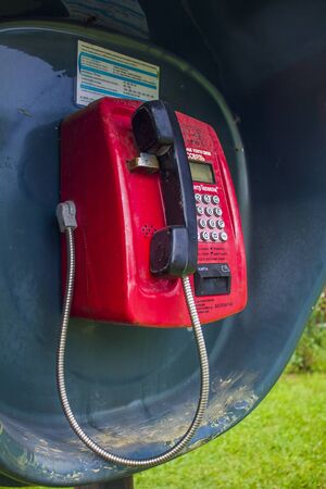 street box with a red phone and a black phoneのeditorial素材