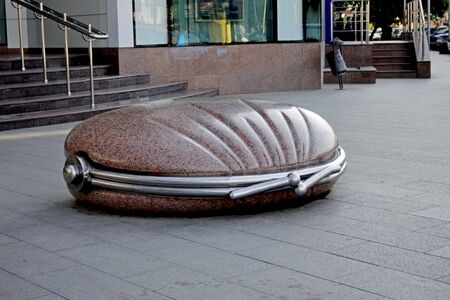 large wallet made of marble lying on the streetのeditorial素材