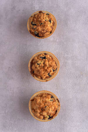 Delicious crumble muffins with raisinsの写真素材