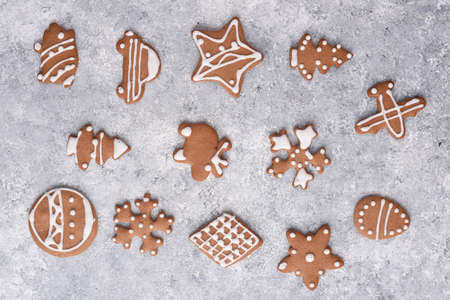Homemade Christmas ginger cookies with different motives in sugar glazeの写真素材