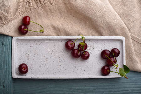 Fresh cherries on the wooden tableの写真素材