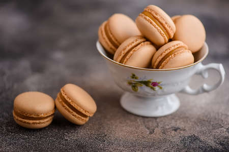 Caramel macarons isolatedの写真素材