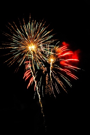 A delicate burst of fireworks in the night skyの写真素材