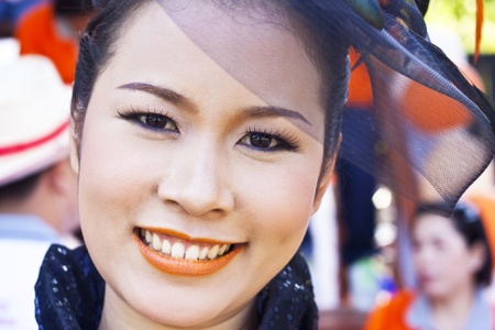 Cheerleaders rising pom-poms, (portrait) at Nan Province of thailandのeditorial素材