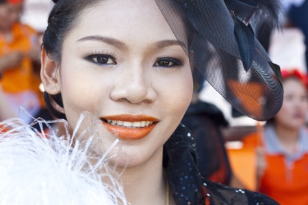 Nan Province, Thailand - November 26, 2011 - Cheerleaders rising pom-poms, Sport Day 2011のeditorial素材