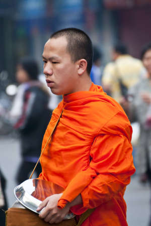 buddhist monks collecting almsのeditorial素材