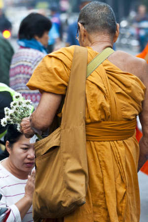 buddhist monks collecting almsのeditorial素材