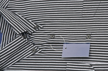 New man s shirt isolated on whiteの写真素材