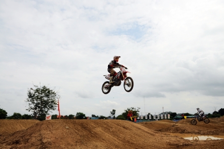 NAN, THAILAND - JUN 02: An unidentified rider participates in the 3rd round (test drive) of Motocross 2012 Thailand motocross Junior championship on June 02, 2012 in Nan Province, Thailand.のeditorial素材