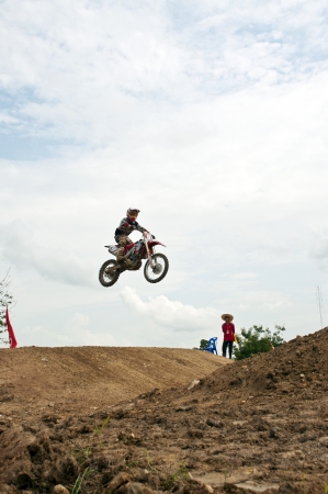 NAN, THAILAND - JUN 02: An unidentified rider participates in the 3rd round (test drive) of Motocross 2012 Thailand motocross Junior championship on June 02, 2012 in Nan Province, Thailand.のeditorial素材