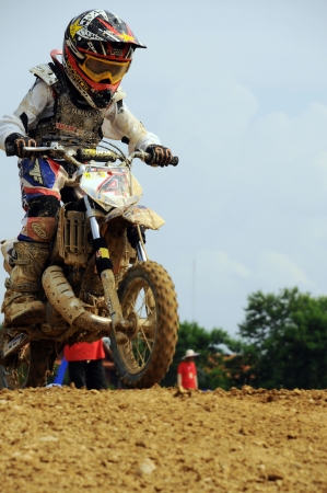 NAN, THAILAND - JUN 02: An unidentified rider participates in the 3rd round (test drive) of Motocross 2012 Thailand motocross Junior championship on June 02, 2012 in Nan Province, Thailand.のeditorial素材