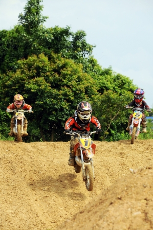 NAN, THAILAND - JUN 02: An unidentified rider participates in the 3rd round (test drive) of Motocross 2012 Thailand motocross Junior championship on June 02, 2012 in Nan Province, Thailand.のeditorial素材
