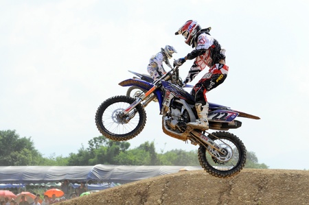 NAN, THAILAND - JUN 03: An unidentified rider participates in the 3rd round (Class A Type) of Motocross 2012 Thailand motocross championship on June 03, 2012 in Nan Province, Thailand.のeditorial素材