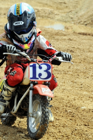 NAN, THAILAND - JUN 03: An unidentified rider participates in the 3rd round  of Motocross 2012 Thailand motocross Junior championship on June 03, 2012 in Nan Province, Thailand.のeditorial素材