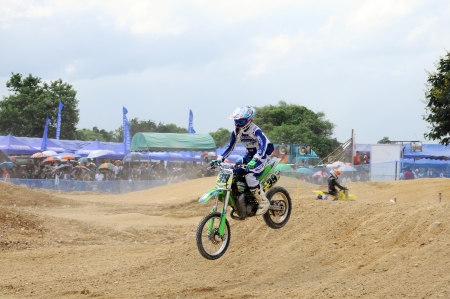 NAN, THAILAND - JUN 03: An unidentified rider participates in the 3rd round (Class C Type) of Motocross 2012 Thailand motocross championship on June 03, 2012 in Nan Province, Thailand.のeditorial素材