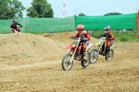 NAN, THAILAND - JUN 03: An unidentified rider participates in the 3rd round (Class C Type) of Motocross 2012 Thailand motocross championship on June 03, 2012 in Nan Province, Thailand.のeditorial素材