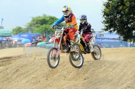 NAN, THAILAND - JUN 03: An unidentified rider participates in the 3rd round (Class C Type) of Motocross 2012 Thailand motocross championship on June 03, 2012 in Nan Province, Thailand.のeditorial素材