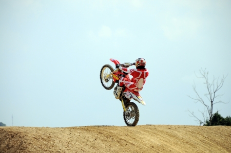 NAN, THAILAND - JUN 03: An unidentified rider participates in the 3rd round (Class C Type) of Motocross 2012 Thailand motocross championship on June 03, 2012 in Nan Province, Thailand.のeditorial素材
