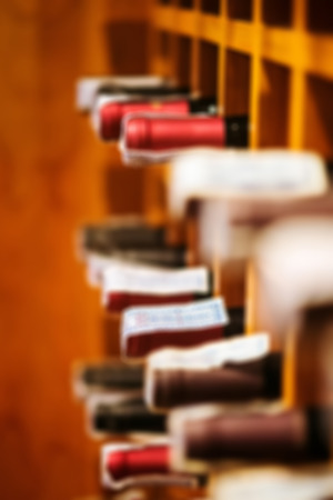 Defocus wine cellar cabinet in luxury restaurantの写真素材