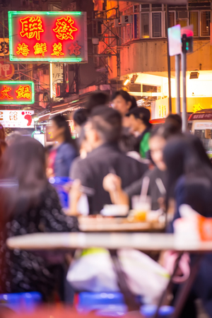 Hong Kong, China - 29 November 2015: Streets of Hong Kong with pedestrians, lights and neon signs at nightのeditorial素材