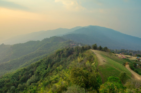 Landscape fog and cloud sky on the mountain with sunset in thailand .の写真素材