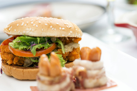 American cheese burger with fresh saladの写真素材