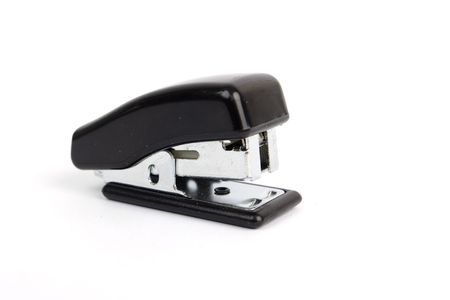 Macro shot of stapler with focus on chrome magazine. Shallow depth of fieldの写真素材