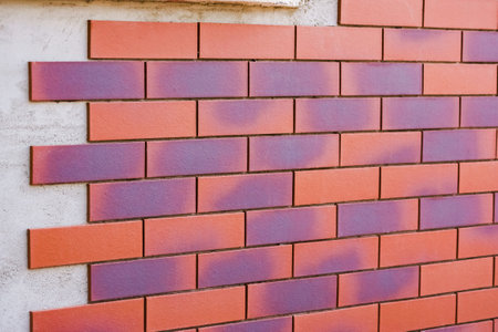 Clinker brick of brown color. Clinker thermal panels for finishing the facade of the house. Tiles for outdoor decorationの写真素材