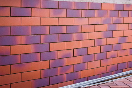 Clinker brick of brown color. Clinker thermal panels for finishing the facade of the house. Tiles for outdoor decorationの写真素材