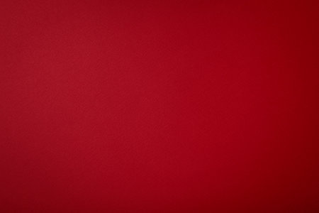 Red background with texture, horizontal, place for text. Empty place.の写真素材