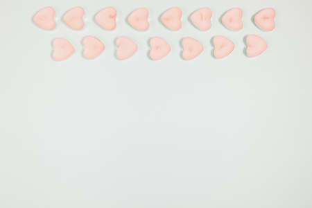 Valentine's Day, composition of hearts on a blue background. View from above. Space for text, flat...