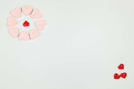 Valentine's Day, composition of hearts on a blue background. View from above. Space for text, flat...