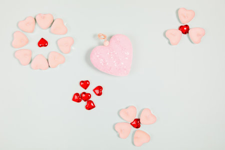 Valentine's Day, composition of hearts on a blue background. View from above. Space for text, flat...