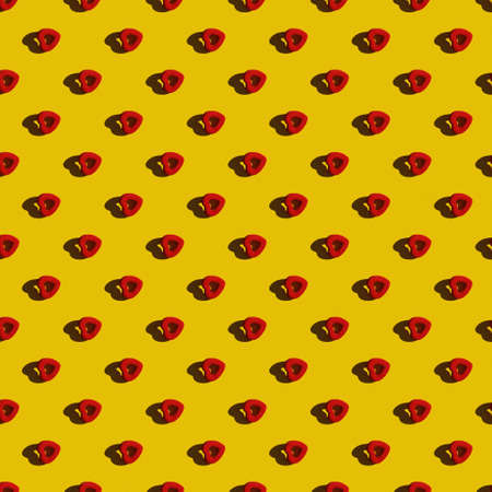 Template. Red heart in a row diagonally on a yellow background. Top view, flat lay, layout. Romantic colorful pattern.の写真素材