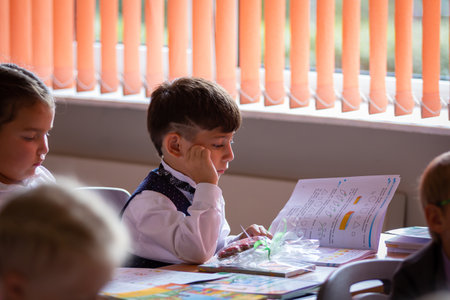 Children sit at their desks in class on September 1. Moscow, Russia, September 2, 2019のeditorial素材