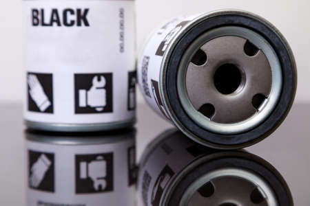 Iron oil filters for the compressor on a white background.