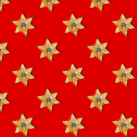 Seamless Christmas texture stars on a red background. Pattern.の写真素材