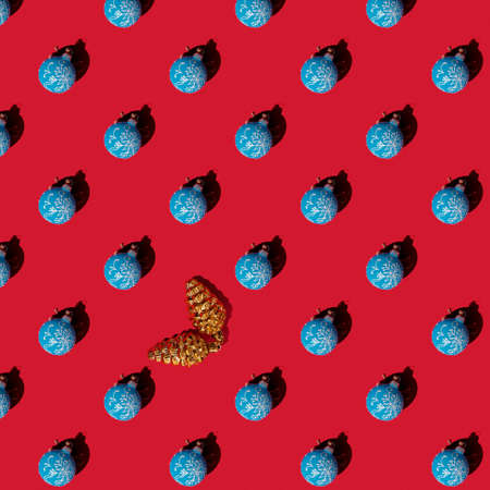 Seamless texture Christmas, blue ball on a red background. Pattern.