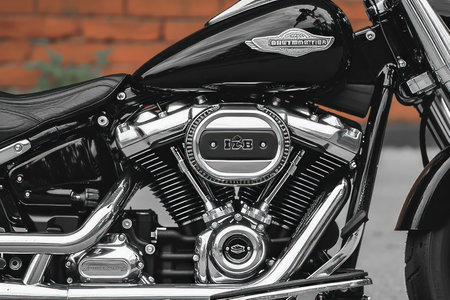 Shiny motorcycle engine in close-up, symbolizing power and speedの素材