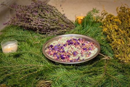 Skillfully created magic brooms made of fragrant dried herbs are ready to give your body and soul gentle care, filling the atmosphere with pleasant aromas and healing properties.の写真素材