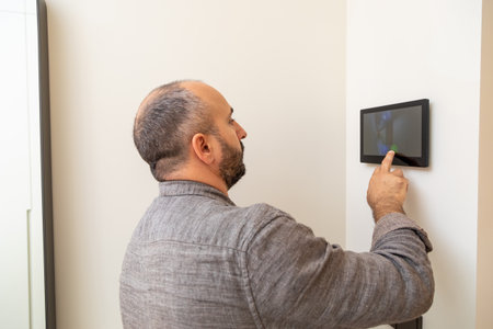 Touch screen interaction on the wall.