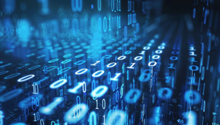 A computer screen shows blue numbers and data with various electronic devices and peripherals in an office environmentの素材