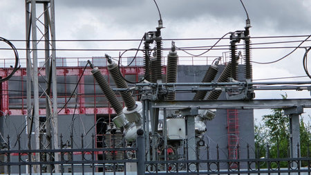 Electrical substation equipment connecting power lines, ensuring safe and reliable electricity...